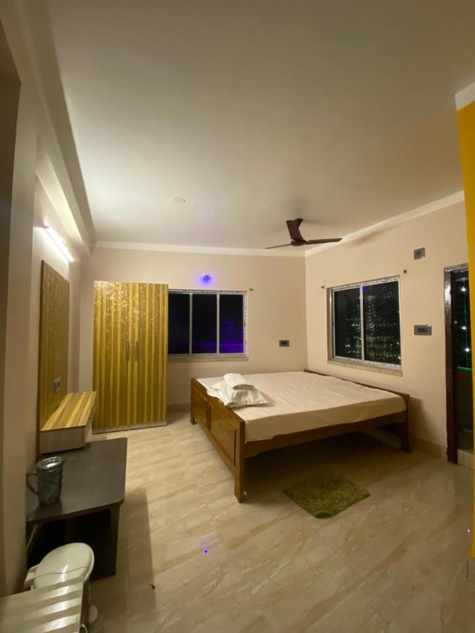 Hotel & Lodge Pankajini ボルプル エクステリア 写真