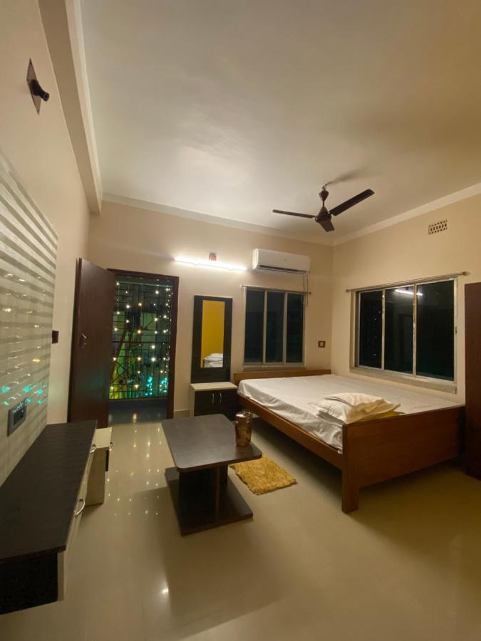 Hotel & Lodge Pankajini ボルプル エクステリア 写真